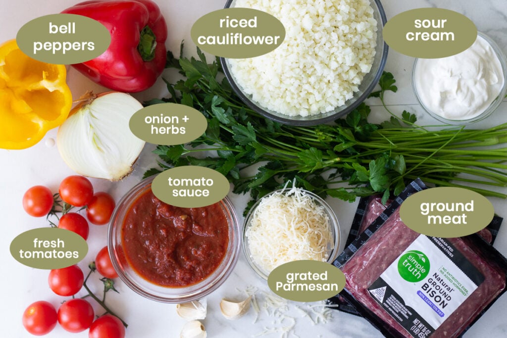All listed ingredients for keto and low-carb stuffed peppers on counter.