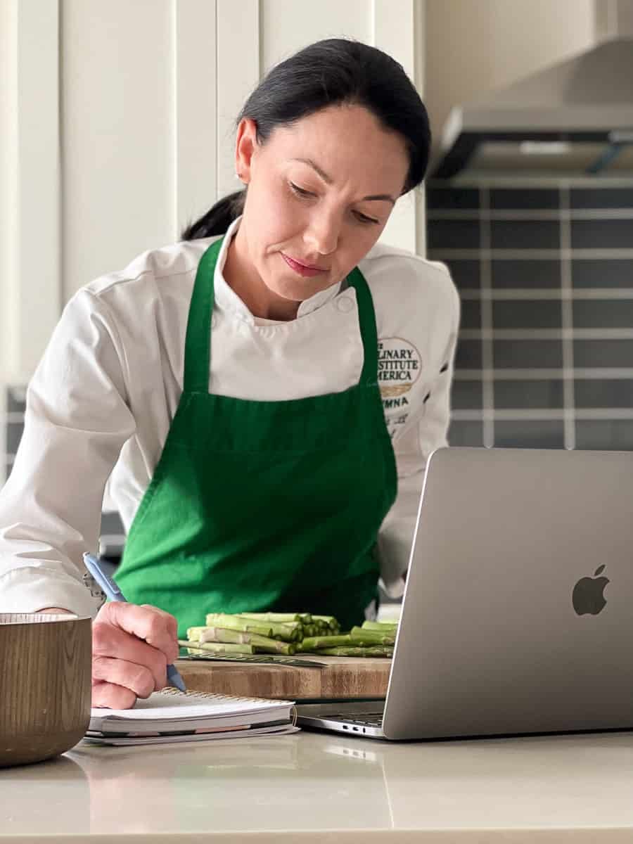 Christina at Edible Times offering meal planning services in a home kitchen in Boise.